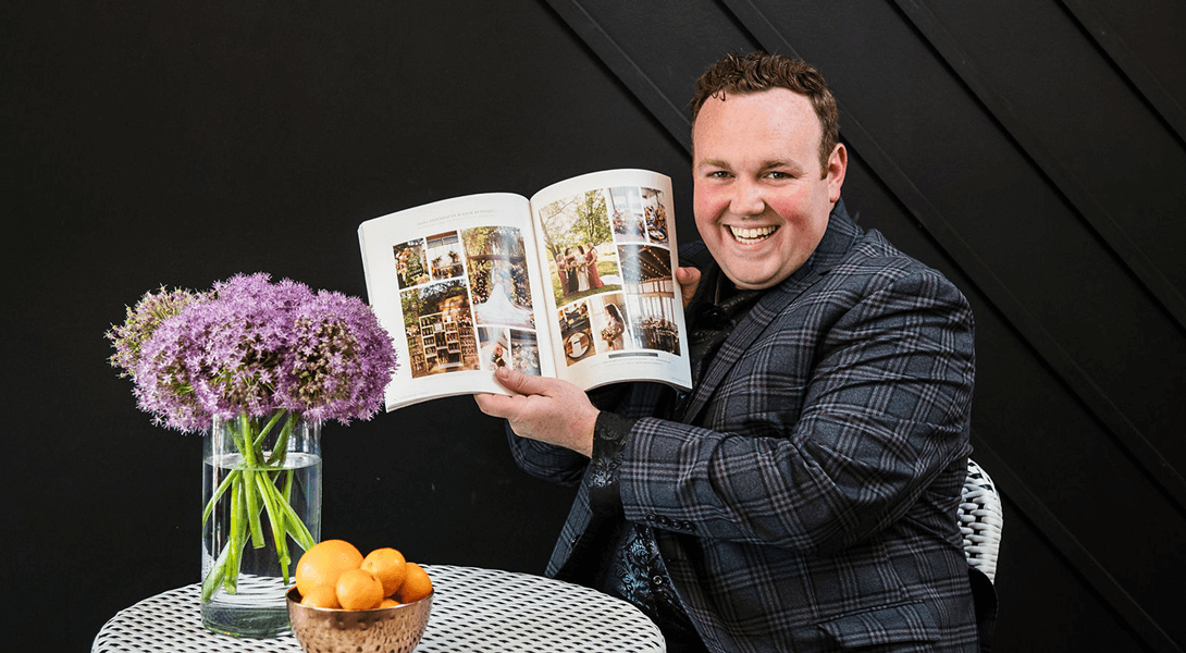 Caleb Butler with Wedding Society Book