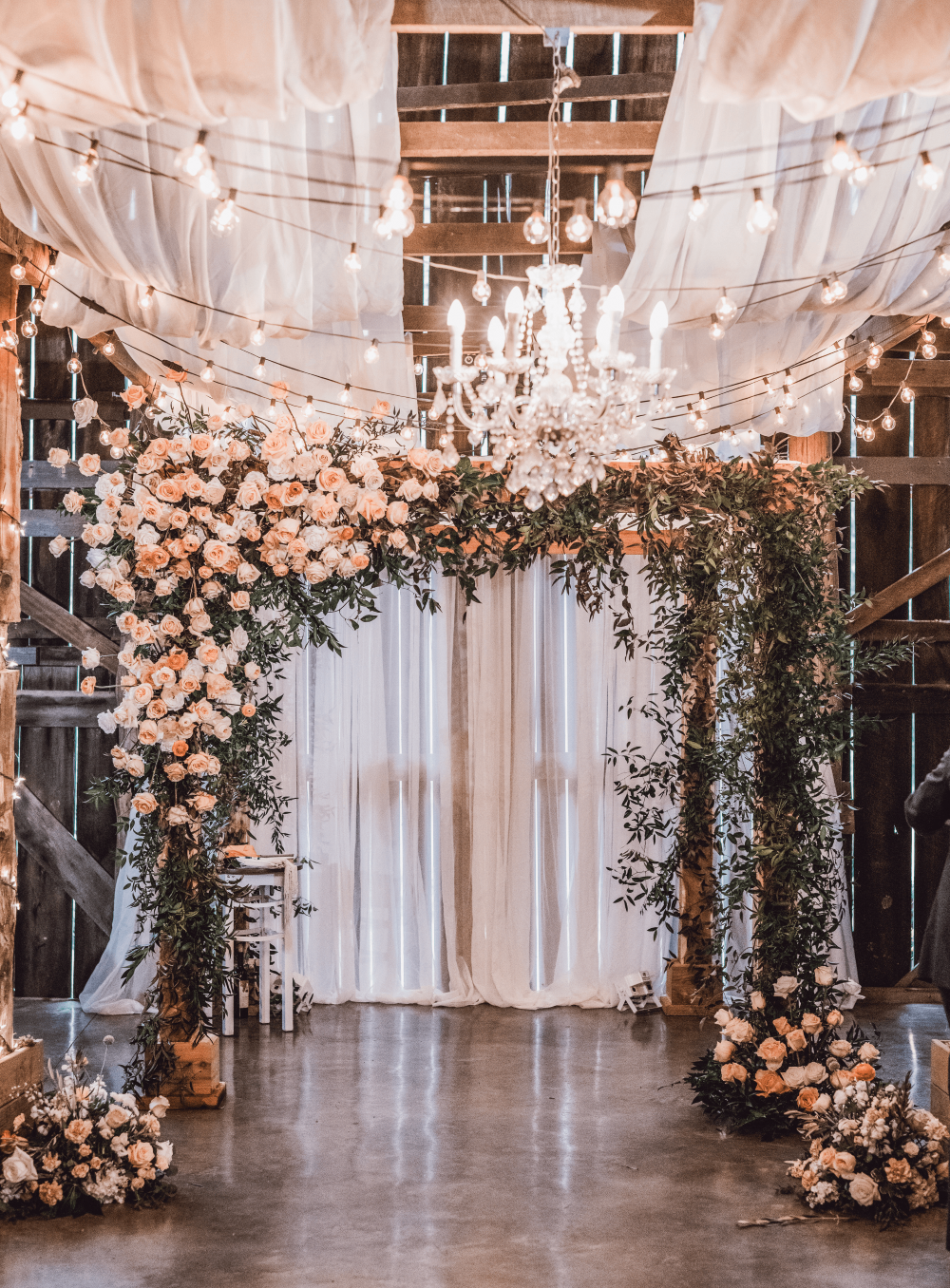vines and flowers decorating an arch