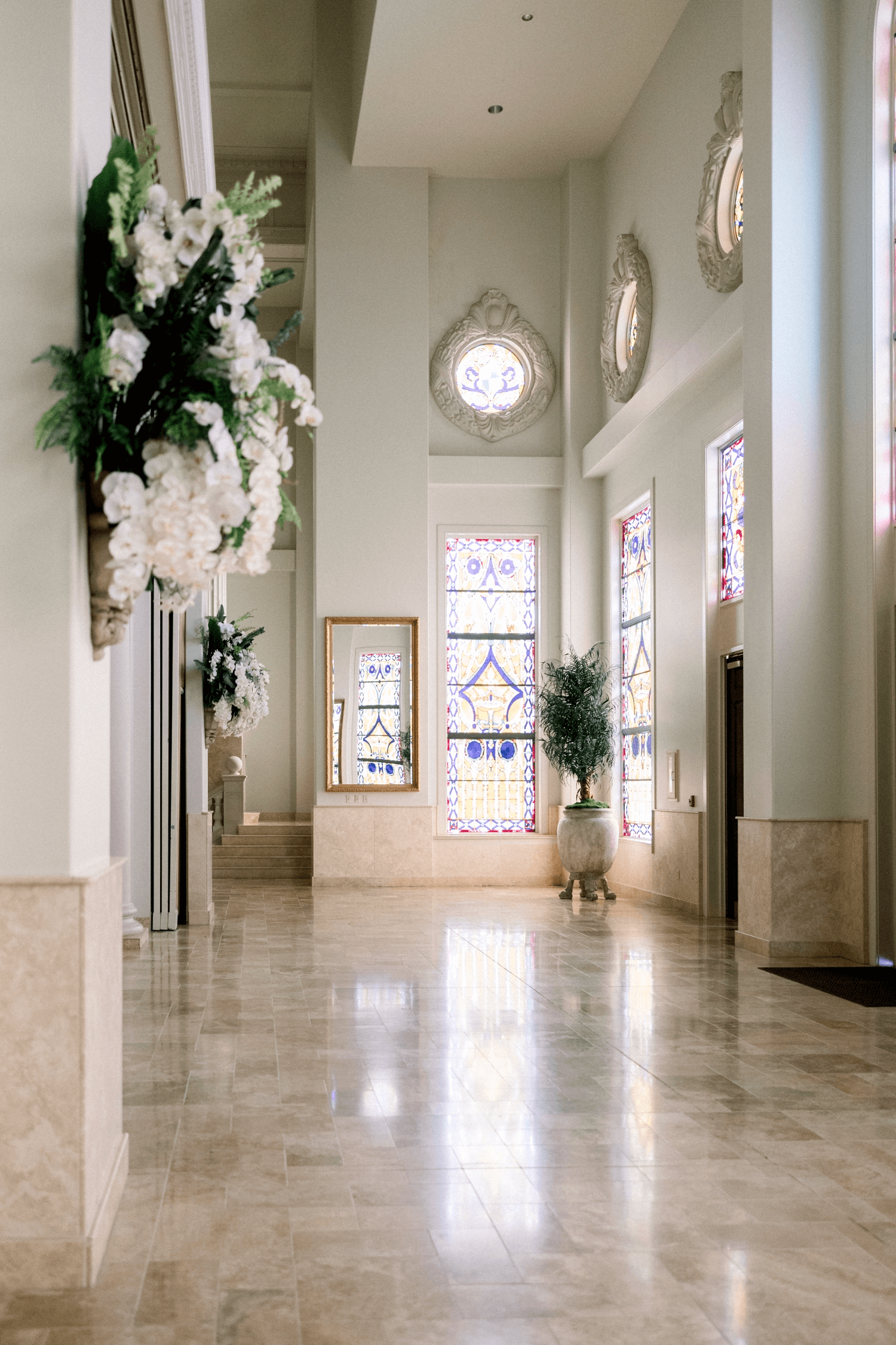 wedding foyer with beautiful stained glass windows
